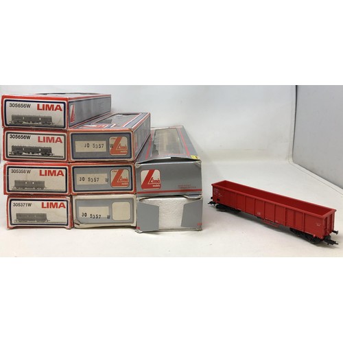 308 - An OO gauge Lima locomotive, another, assorted Lima rolling stock and carriages, No 30656W, 305656W,... 