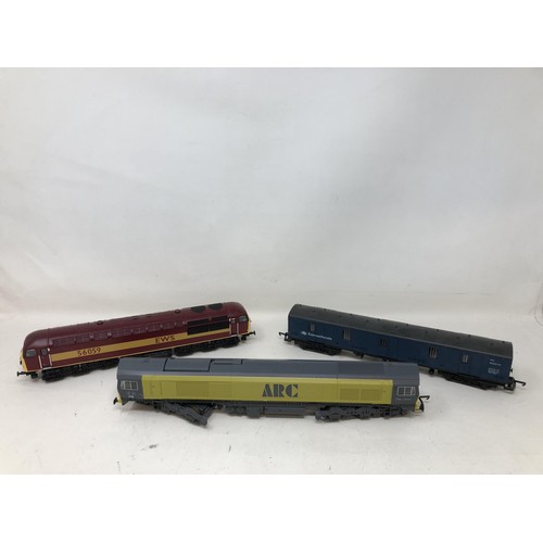 308 - An OO gauge Lima locomotive, another, assorted Lima rolling stock and carriages, No 30656W, 305656W,... 