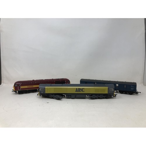 308 - An OO gauge Lima locomotive, another, assorted Lima rolling stock and carriages, No 30656W, 305656W,... 