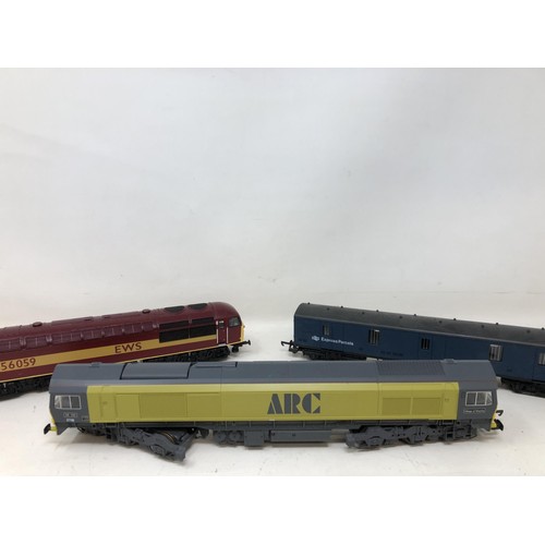 308 - An OO gauge Lima locomotive, another, assorted Lima rolling stock and carriages, No 30656W, 305656W,... 