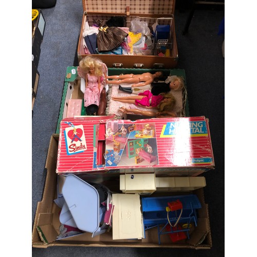 335 - A Sindy nursing hospital, boxed, assorted Sindy, Barbie and Ken dolls, furniture and other accessori... 