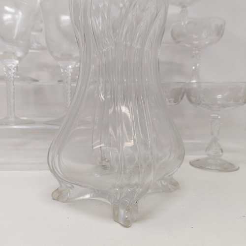 804 - A glass decanter, with a silver mount, a pair of wine glasses, with air twist stems, four rummers, a... 