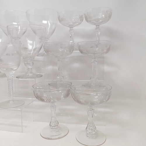 804 - A glass decanter, with a silver mount, a pair of wine glasses, with air twist stems, four rummers, a... 