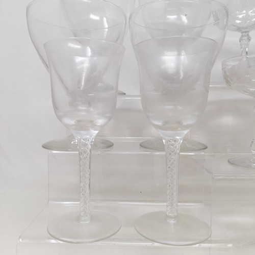 804 - A glass decanter, with a silver mount, a pair of wine glasses, with air twist stems, four rummers, a... 