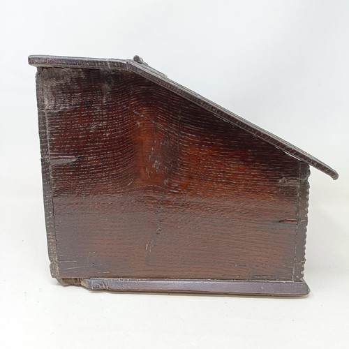 805 - An oak box, with a sloping lid, 26 cm wide