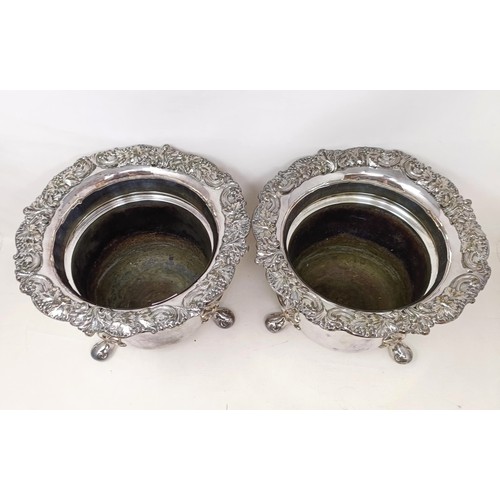 817 - A pair of silver plate champagne buckets