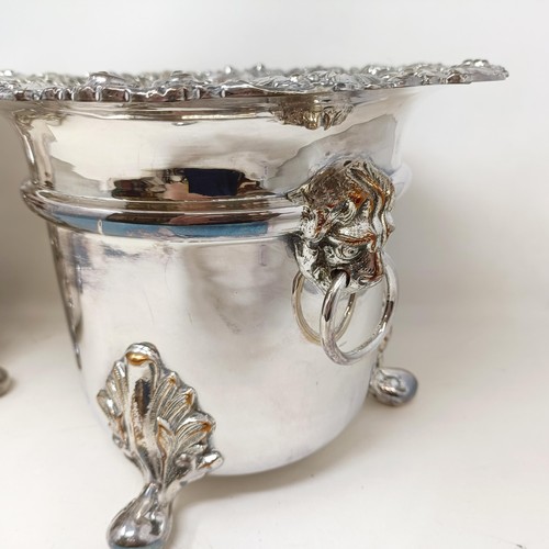 817 - A pair of silver plate champagne buckets