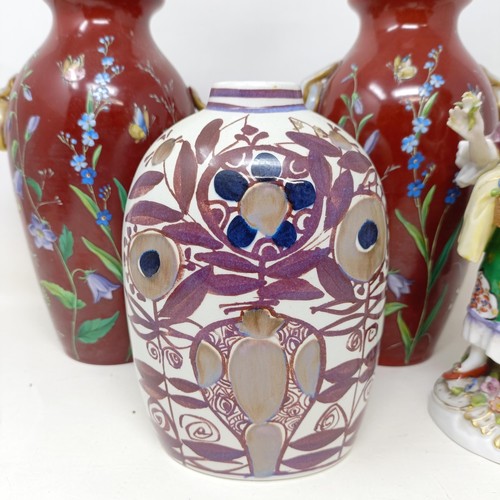 819 - A pair of late 19th century opaque glass vases, with over enamel decoration, decorated flowers and b... 