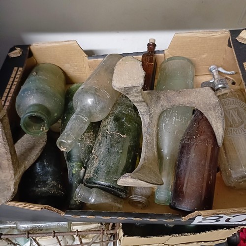 829 - Assorted vintage glass bottles, dolls and sporting items (qty)