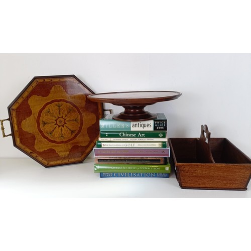 830 - A mahogany cutlery tray, 40 cm wide, a mahogany dumb waiter, 40 cm diameter, a hexagonal tray, and a... 