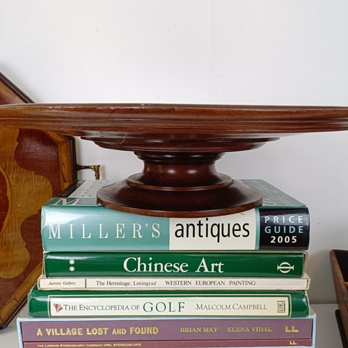 830 - A mahogany cutlery tray, 40 cm wide, a mahogany dumb waiter, 40 cm diameter, a hexagonal tray, and a... 