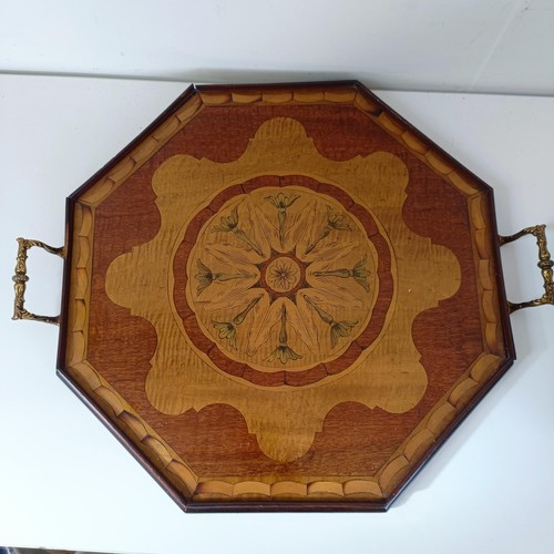 830 - A mahogany cutlery tray, 40 cm wide, a mahogany dumb waiter, 40 cm diameter, a hexagonal tray, and a... 