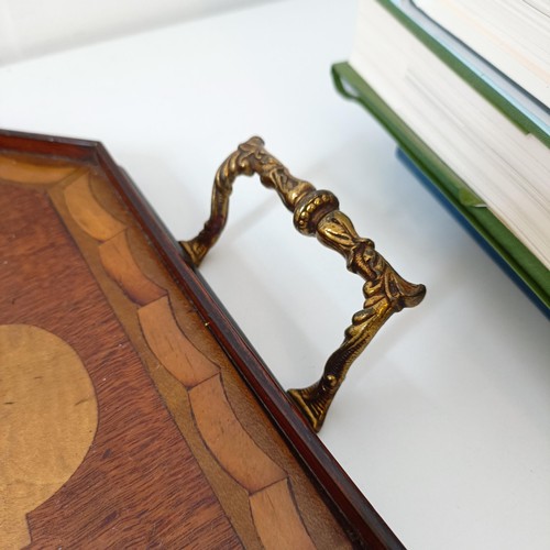 830 - A mahogany cutlery tray, 40 cm wide, a mahogany dumb waiter, 40 cm diameter, a hexagonal tray, and a... 