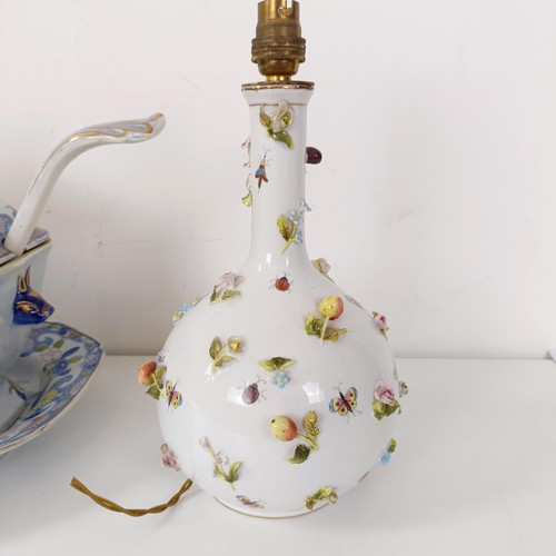 832 - A Masons ironstone tureen and cover, on a stand with a ladle, 43 cm wide, and a lamp base, decorated... 