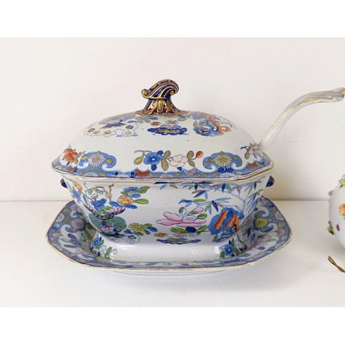 832 - A Masons ironstone tureen and cover, on a stand with a ladle, 43 cm wide, and a lamp base, decorated... 