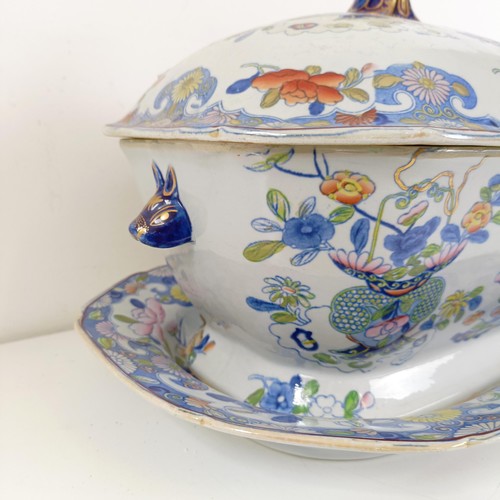 832 - A Masons ironstone tureen and cover, on a stand with a ladle, 43 cm wide, and a lamp base, decorated... 