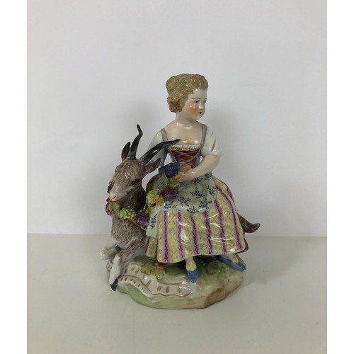 876 - A Dresden group, of a girl with a goat, 15 cm high, and a pair of Dresden figural salts (3)