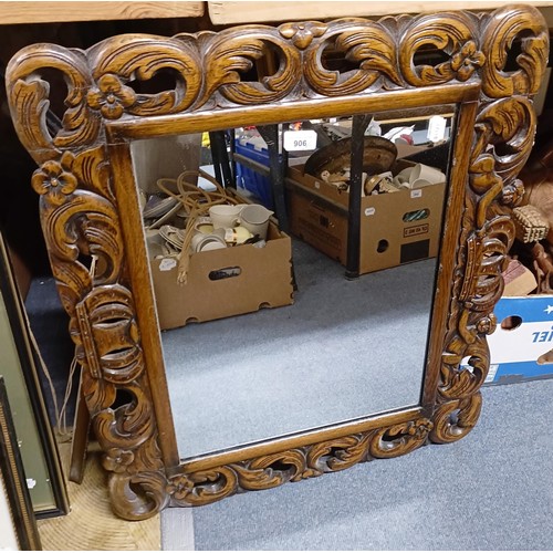 906 - An oak framed wall mirror, assorted prints, pictures and mirrors (qty)