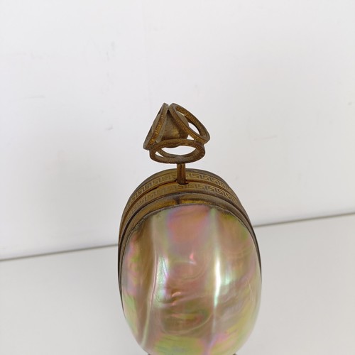 913 - A mother of pearl and gilt metal novelty perfume bottle holder, 27 cm high