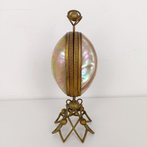 913 - A mother of pearl and gilt metal novelty perfume bottle holder, 27 cm high