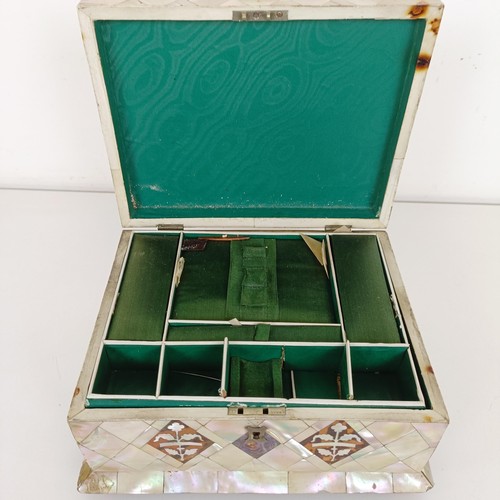 915 - A mother of pearl veneered jewellery box, 23 cm wide