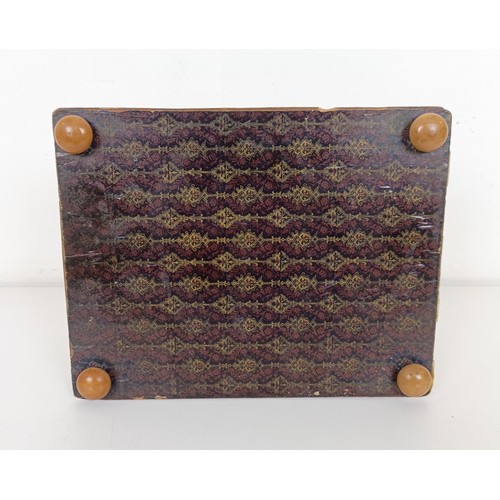 915 - A mother of pearl veneered jewellery box, 23 cm wide