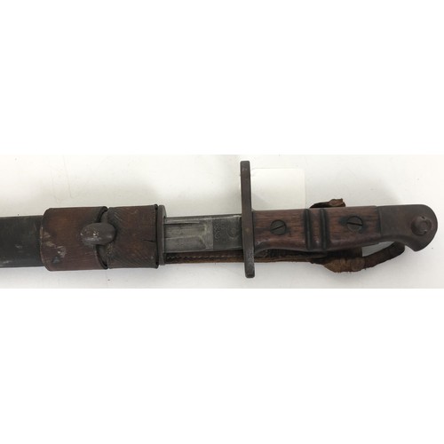 531 - A Remington bayonet, numbered 1913 5 16, in a scabbard with a hangar