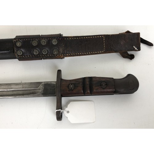 531 - A Remington bayonet, numbered 1913 5 16, in a scabbard with a hangar