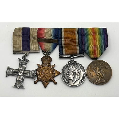 538 - A group of four medals, awarded to Lt John A Tandy, comprising a Military Cross, privately named and... 