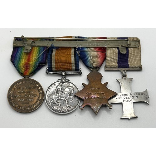 538 - A group of four medals, awarded to Lt John A Tandy, comprising a Military Cross, privately named and... 