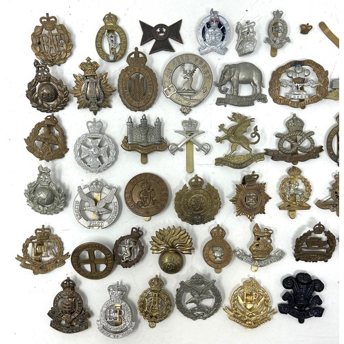 566 - Assorted military badges