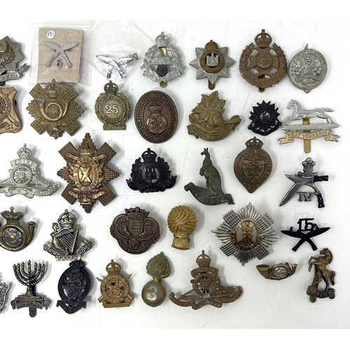 569 - Assorted military badges