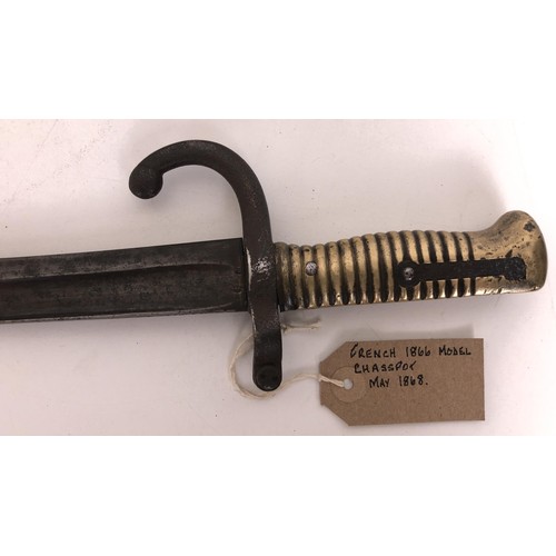 525 - A French 1855 model bayonet, with scabbard, 71 cm