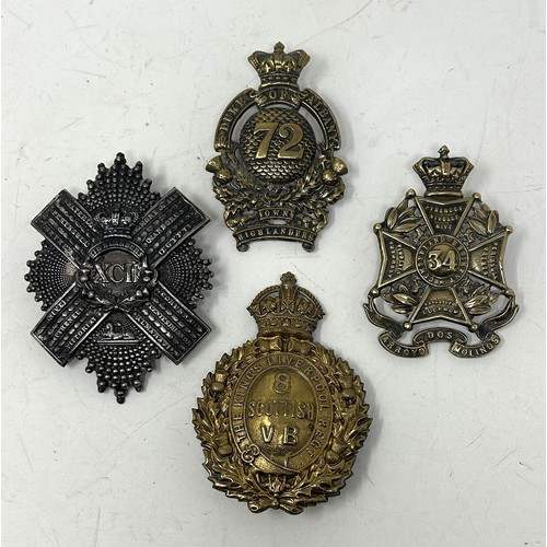 578 - A Duke of Albany's Own Highlanders badge, and three other badges (4)