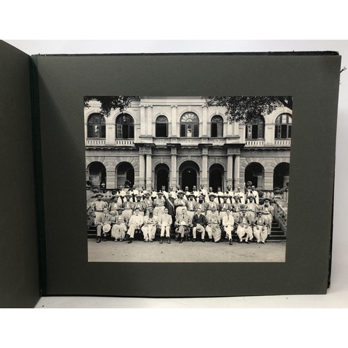 598 - An early 20th century photograph album, including formal military groups, sporting images and others