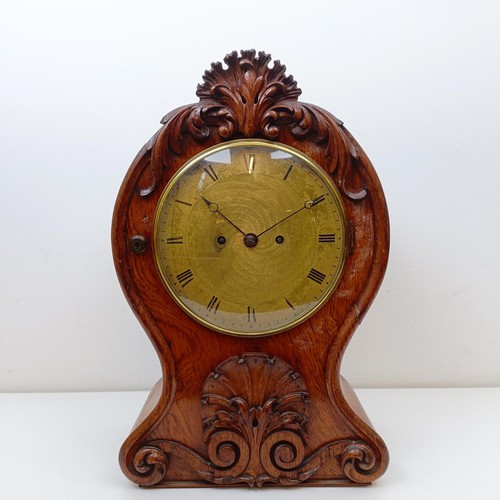 976 - A Victorian mantel clock, the brass dial with Roman numerals, fitted an eight day double fusee movem... 