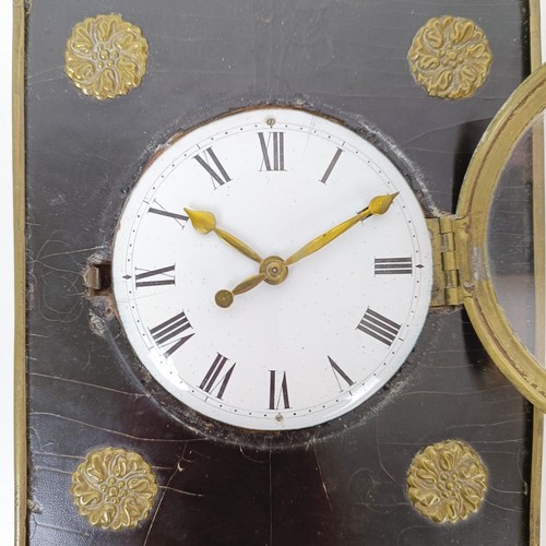 973 - A sedan chair clock, in an ebonised and metal case, fitted a later movement, 20 x 13 cm