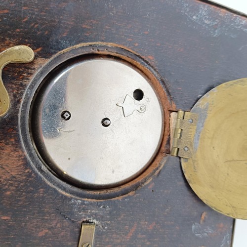 973 - A sedan chair clock, in an ebonised and metal case, fitted a later movement, 20 x 13 cm