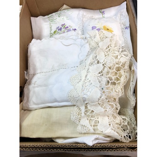 894 - A vintage wedding dress, assorted linen and lace (3 boxes)