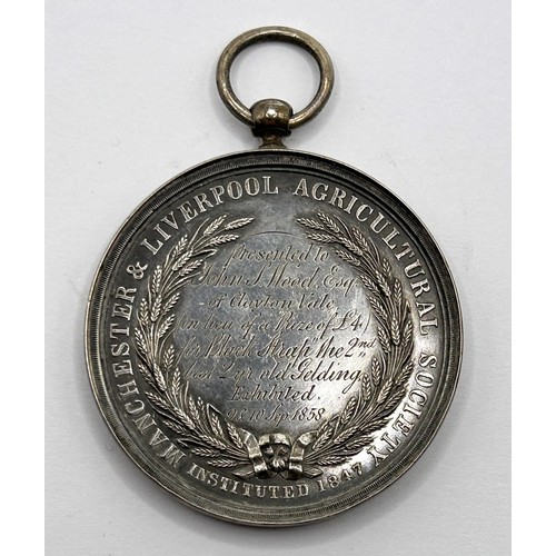 494 - A Manchester & Liverpool Agricultural Society silver medallion, 1858, with a later mount