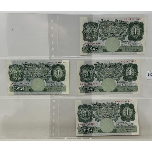 495 - A group of sixteen green £1 banknotes, and six blue £1 banknotes