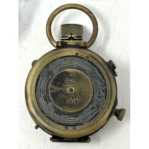 539 - A WWI compass, 1918, in a leather Pulley & Powell 1916 leather case, and a pair of heavily tinte... 