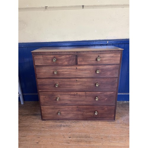 1083 - A mahogany chest, having two short and four long graduated drawers, lacking base, 107 cm wide, a two... 