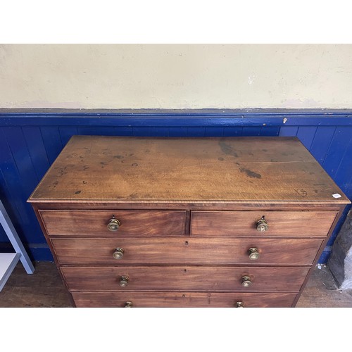 1083 - A mahogany chest, having two short and four long graduated drawers, lacking base, 107 cm wide, a two... 