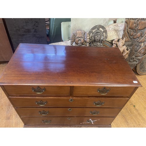 1046 - A 19th century mahogany chest, having two short and three long drawers, 105 cm wide