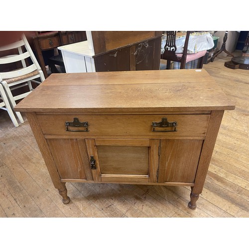 1063 - A painted dressing chest, 93 cm wide, a painted two drawer chest, 84 cm wide, an oak cupboard, and a... 