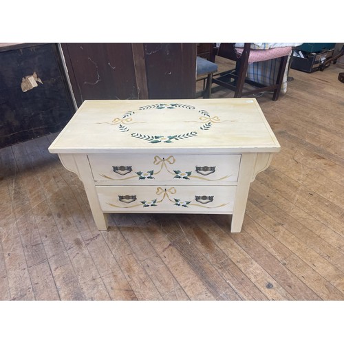 1063 - A painted dressing chest, 93 cm wide, a painted two drawer chest, 84 cm wide, an oak cupboard, and a... 