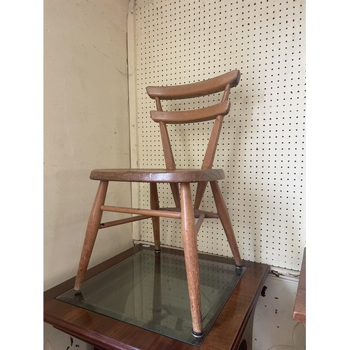 993 - A pine dresser base, 125 cm wide, an oak drop leaf table, a rocking chair, a wine rack, a doll's hig... 