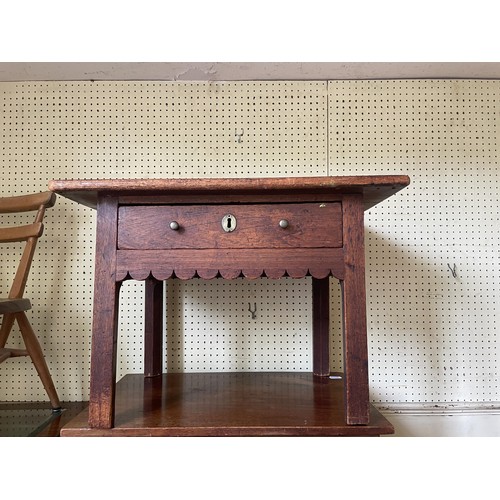 993 - A pine dresser base, 125 cm wide, an oak drop leaf table, a rocking chair, a wine rack, a doll's hig... 