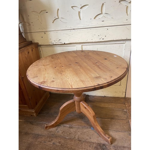 993 - A pine dresser base, 125 cm wide, an oak drop leaf table, a rocking chair, a wine rack, a doll's hig... 